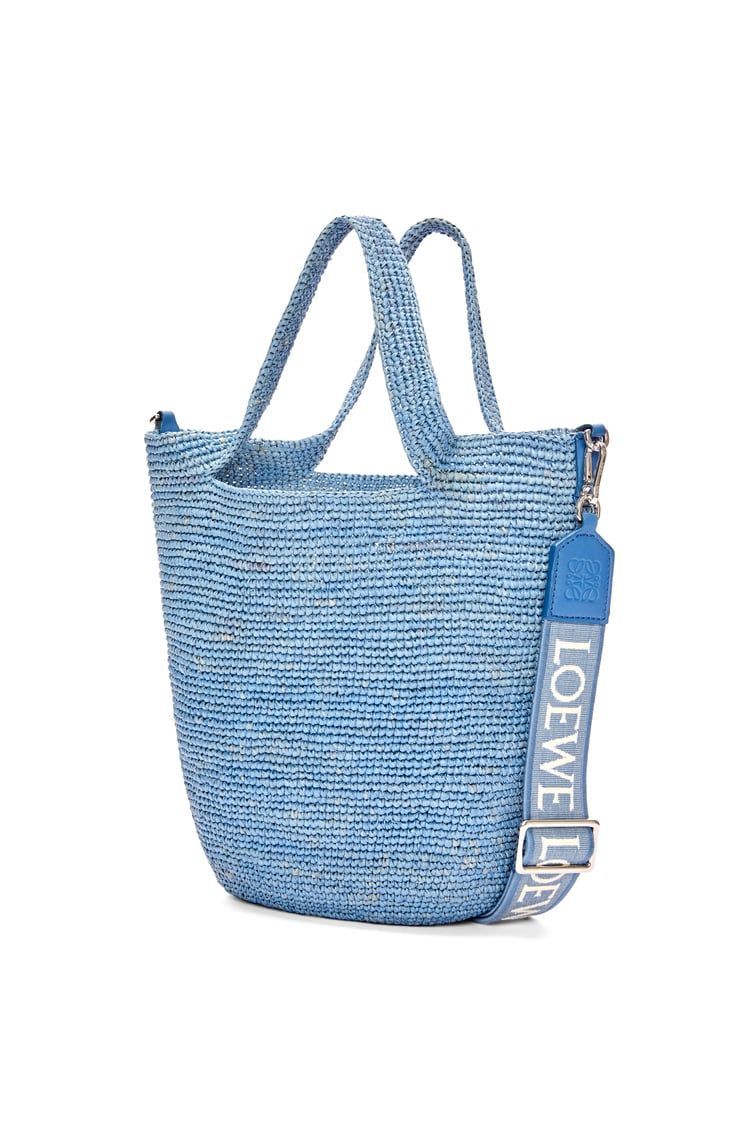 Slit bag in raffia and calfskin