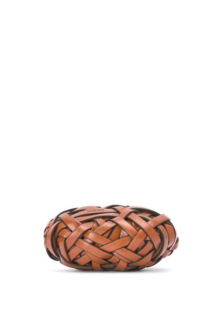 Nest woven paperweight in stone and calfskin