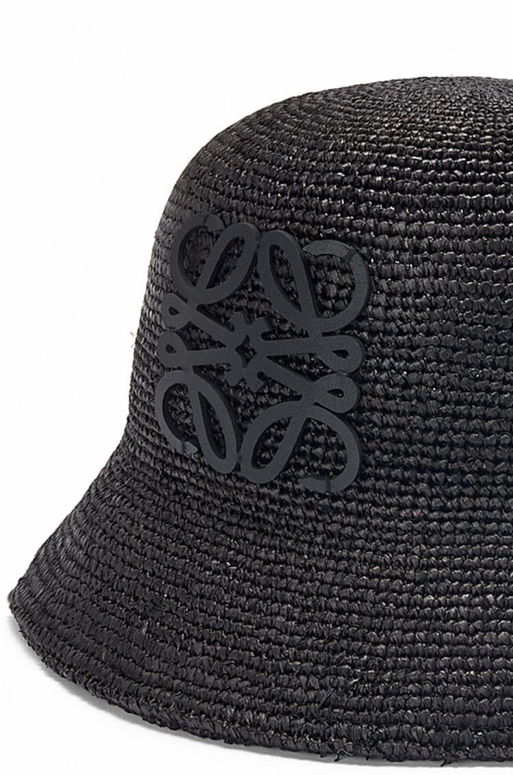 Bucket hat in raffia and calfskin