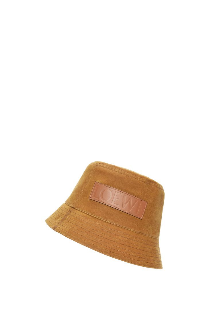 Bucket hat in waxed canvas and calfskin