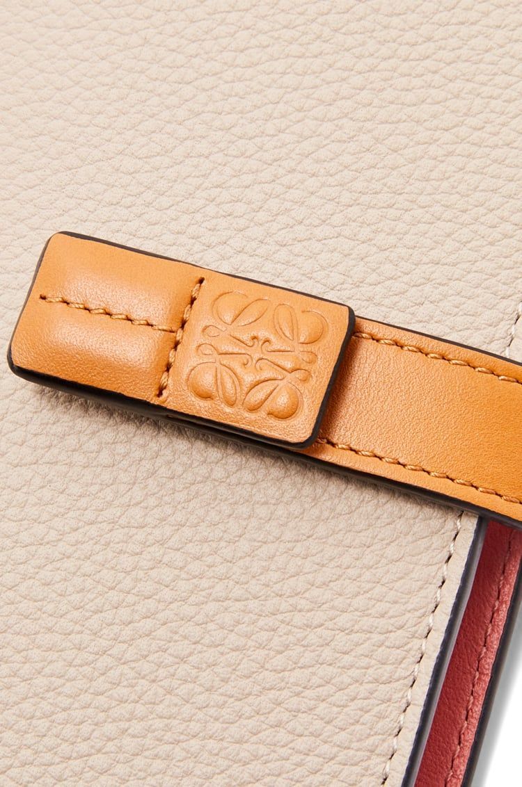 Large vertical wallet in grained calfskin