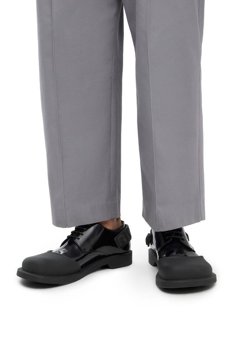 Derby shoe in rubber and brushed-off calfskin