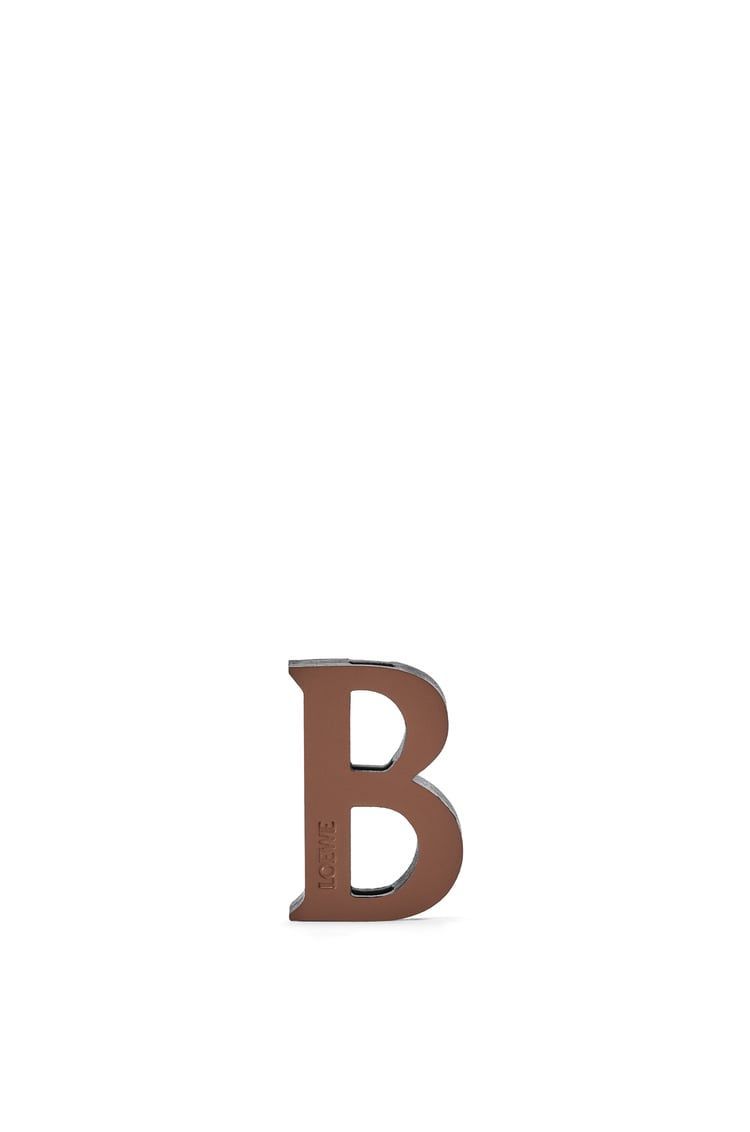 Letter dice in calfskin and brass