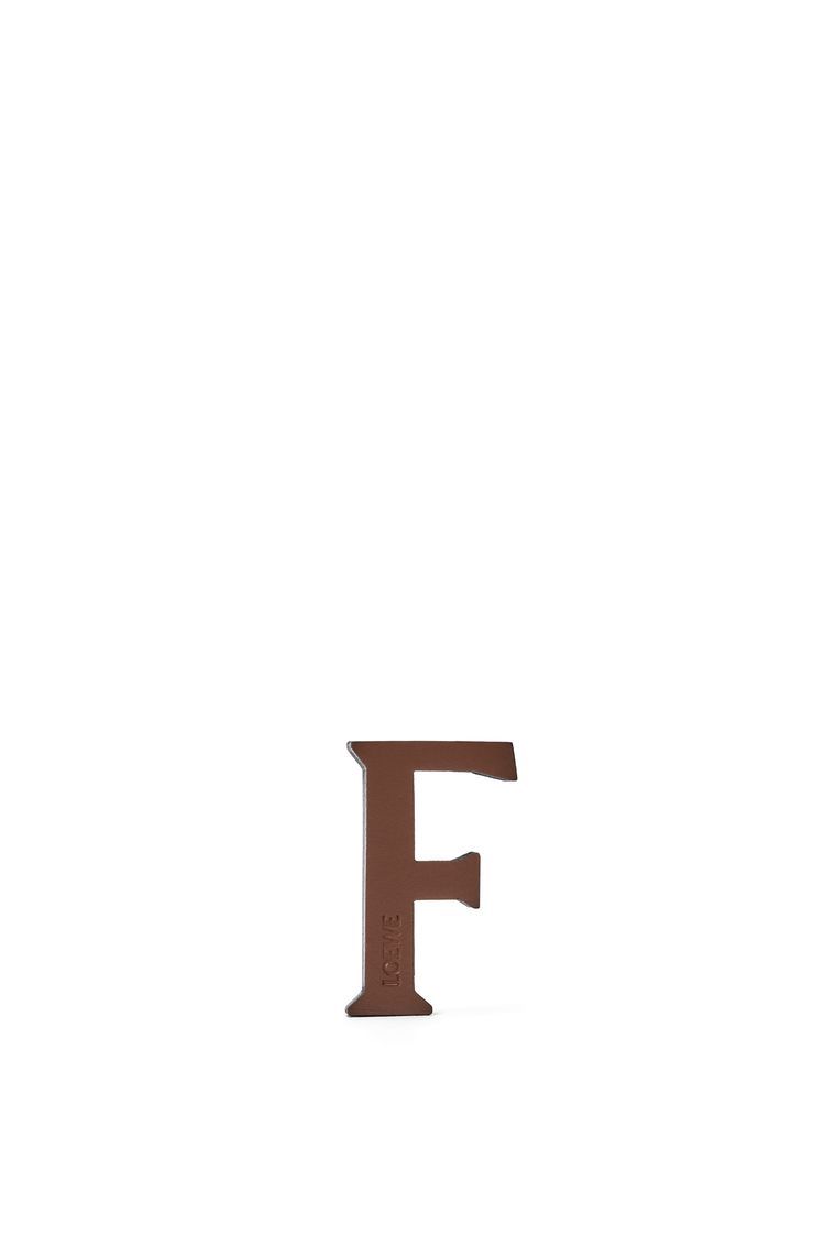 Letter dice in calfskin and brass