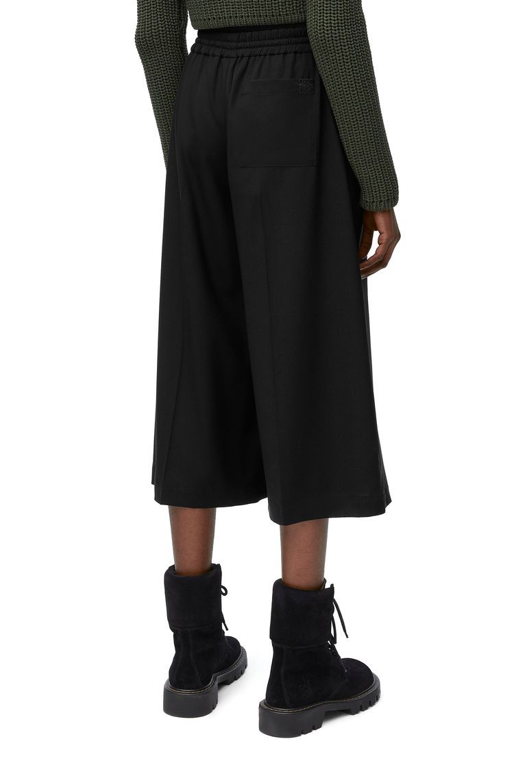 Cropped trousers in wool