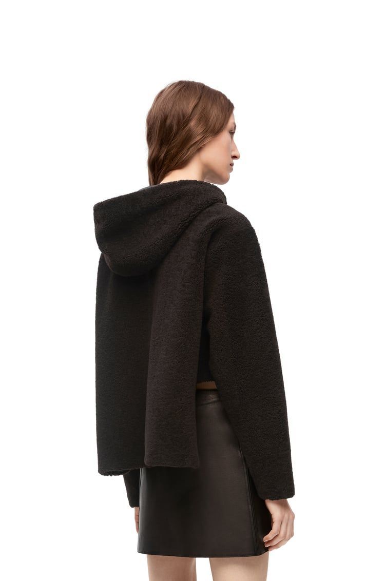 Hooded jacket in shearling
