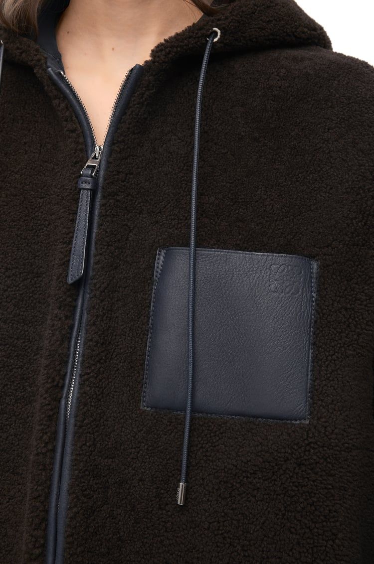 Hooded jacket in shearling