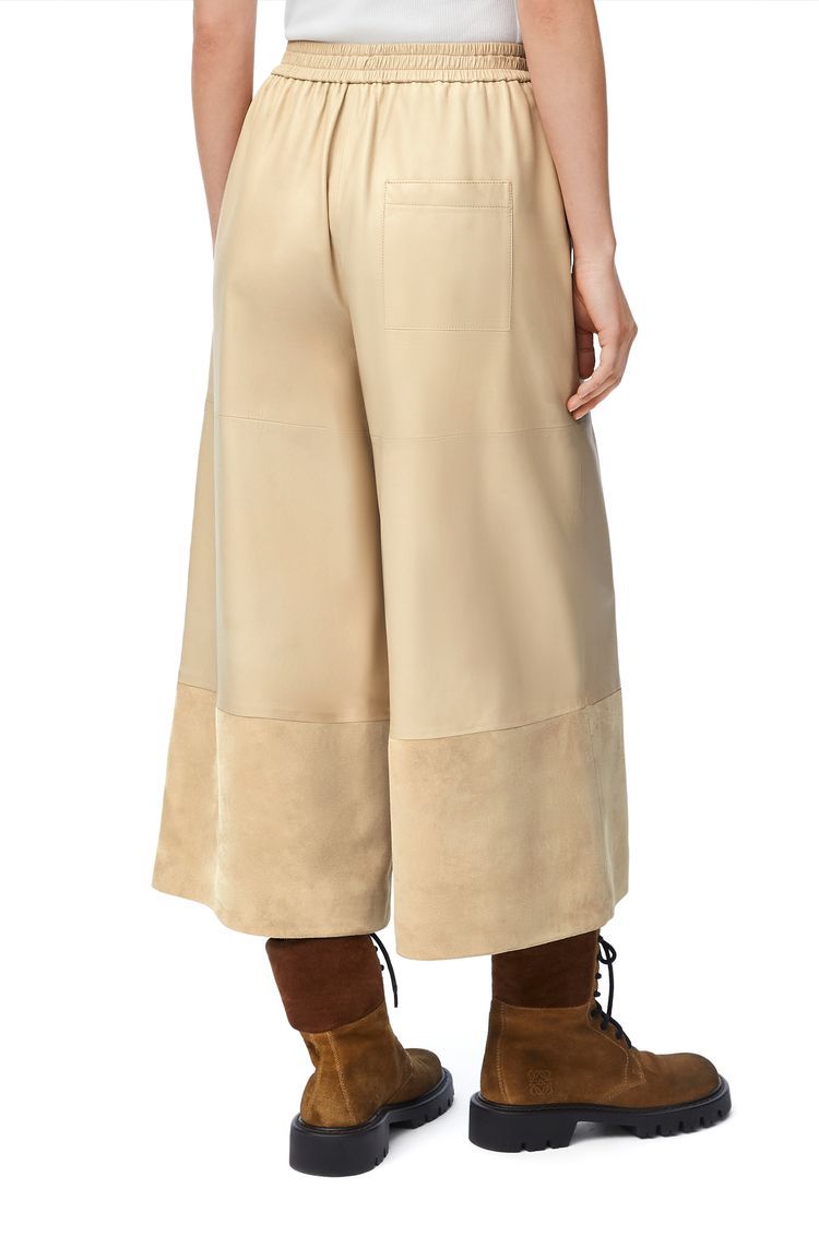 Cropped trousers in nappa lambskin and suede goatskin