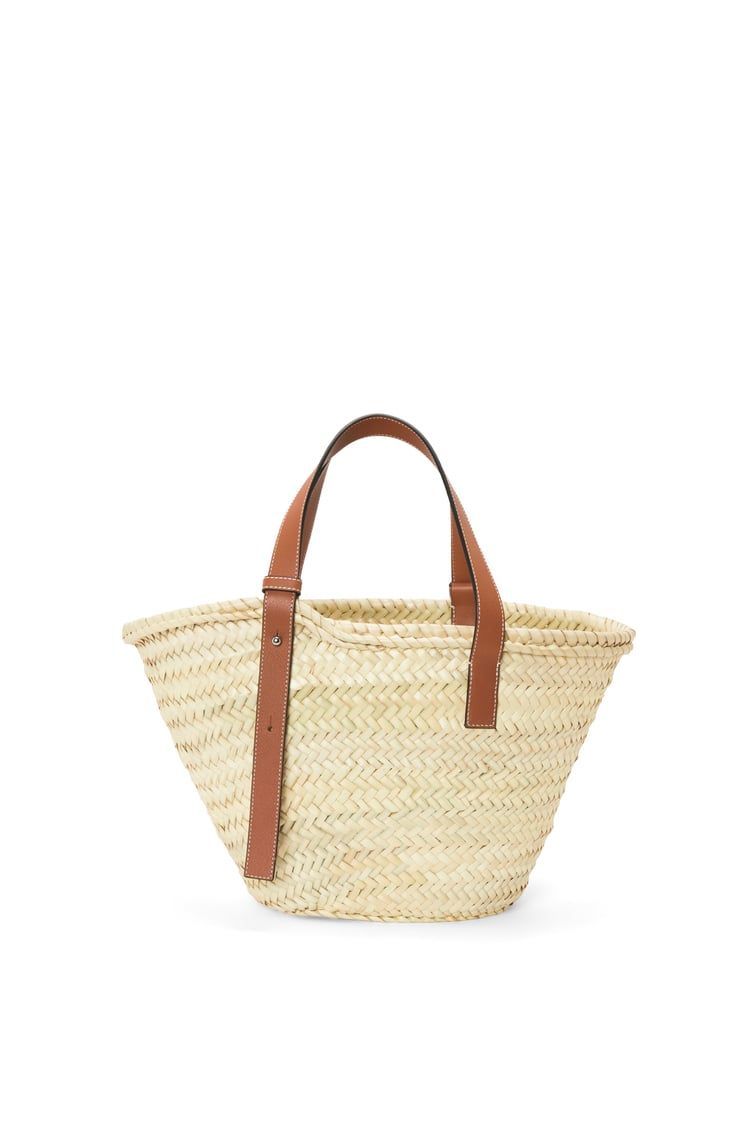 Basket bag in palm leaf and calfskin & Fish drawstring pouch in denim