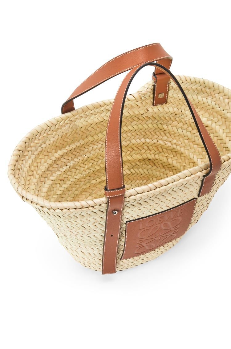 Basket bag in palm leaf and calfskin & Fish drawstring pouch in denim