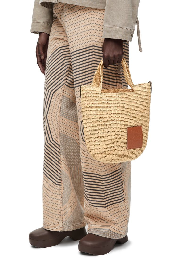 Slit bag in raffia and calfskin