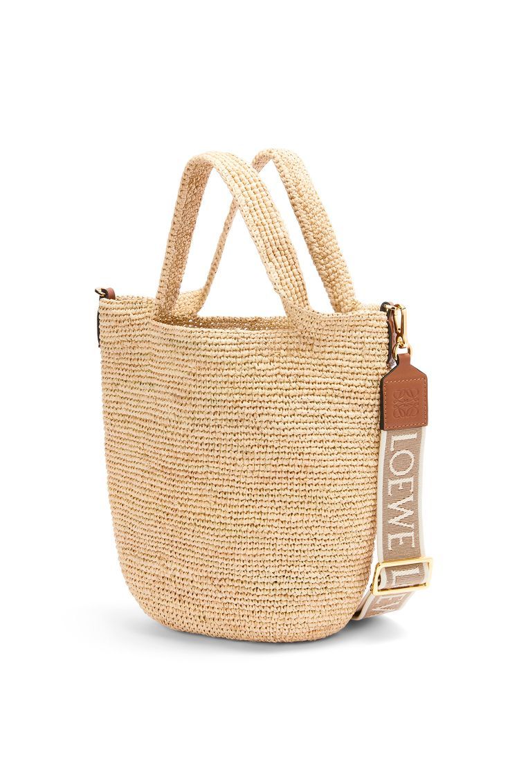 Slit bag in raffia and calfskin