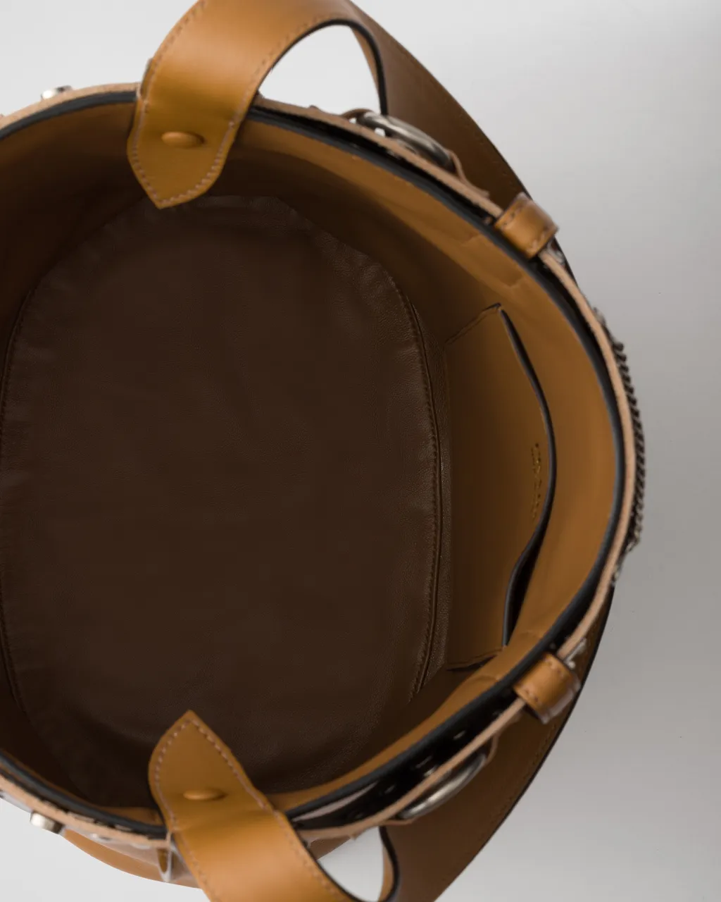 Prada Buckle Leather Bucket Bag With Studded Belt