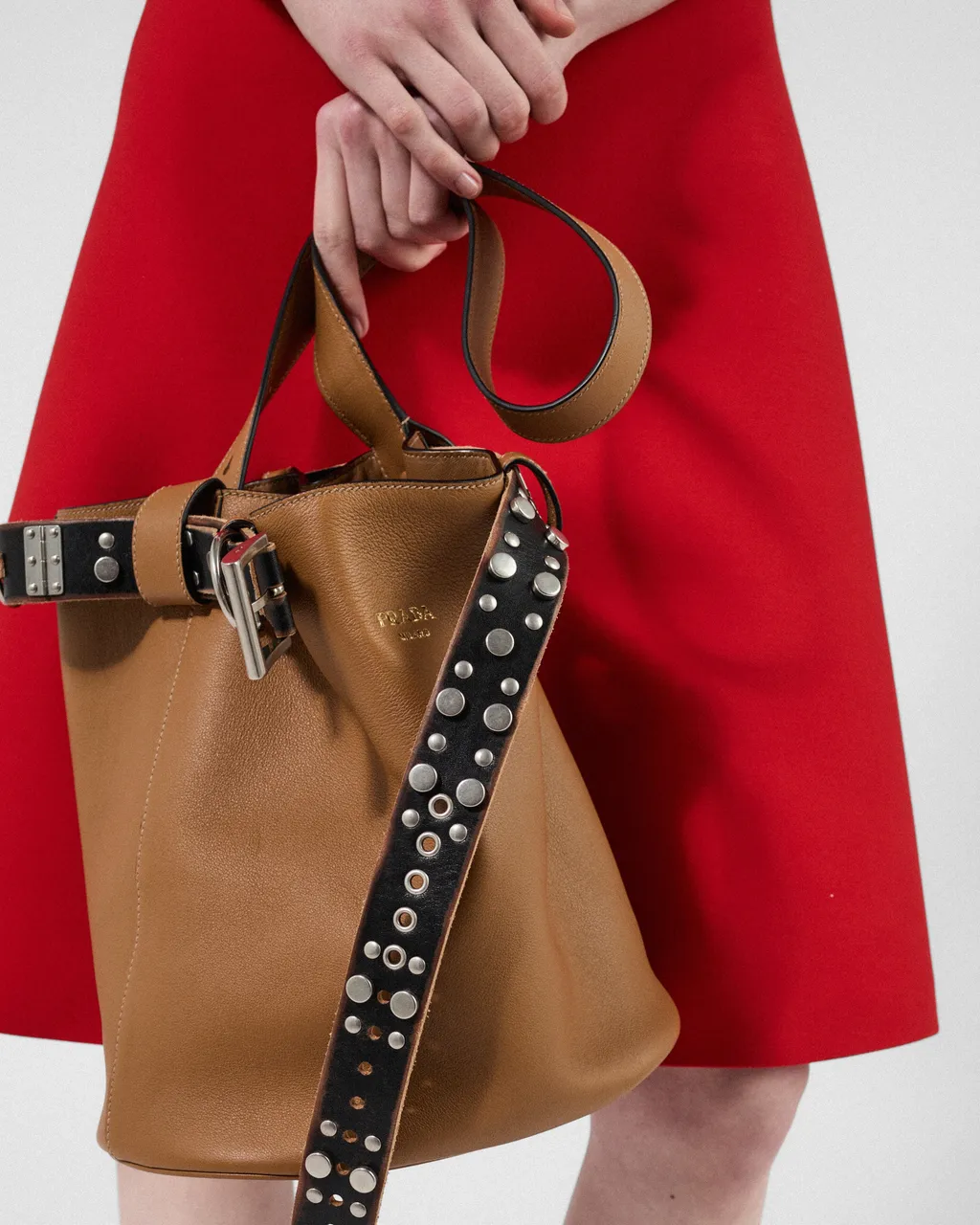 Prada Buckle Leather Bucket Bag With Studded Belt
