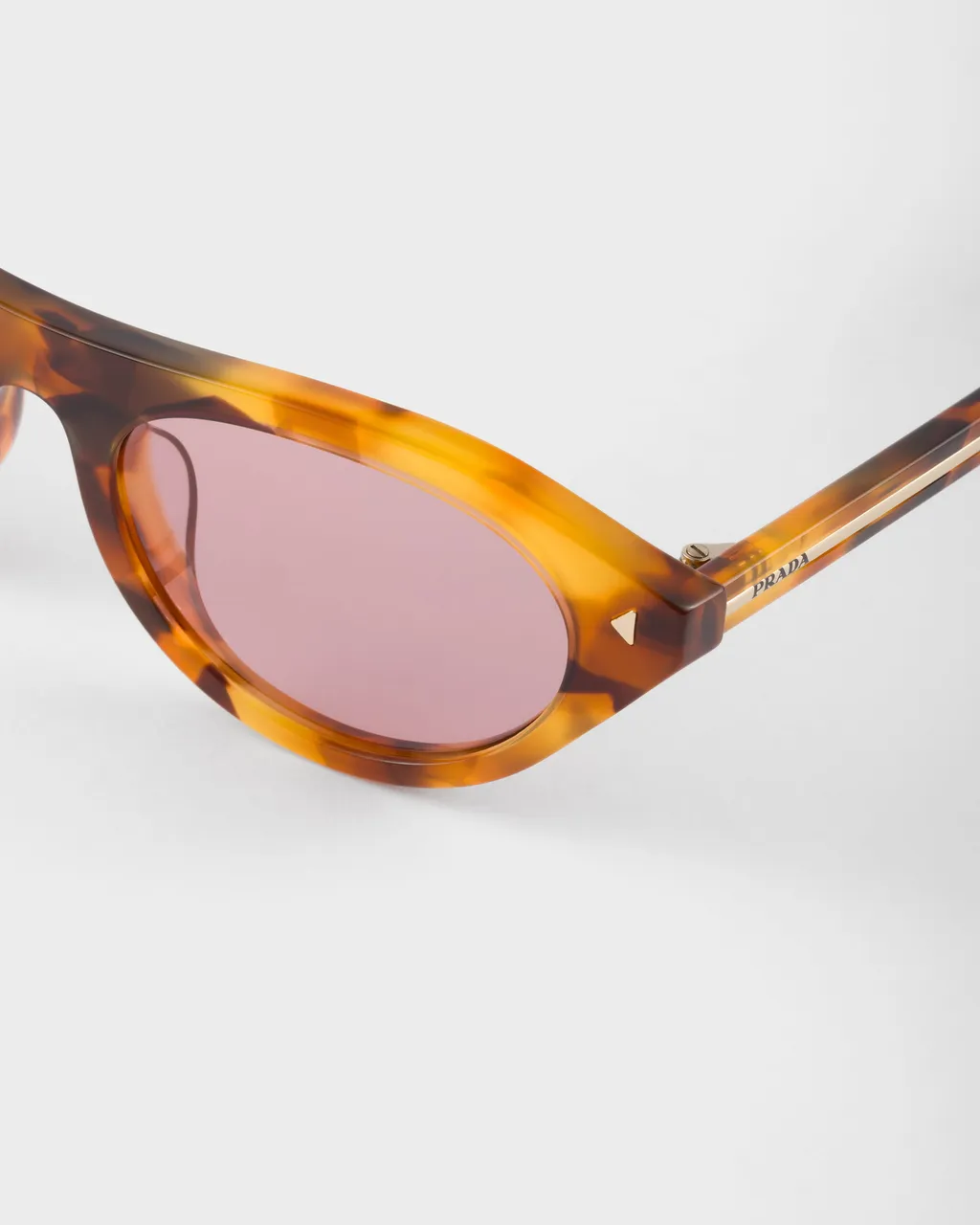 Prada Sunglasses With The Iconic Metal Plaque