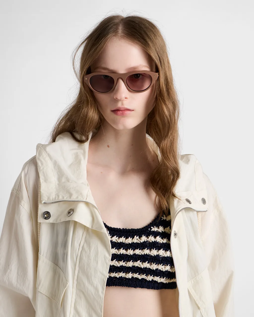 Prada Sunglasses With The Iconic Metal Plaque