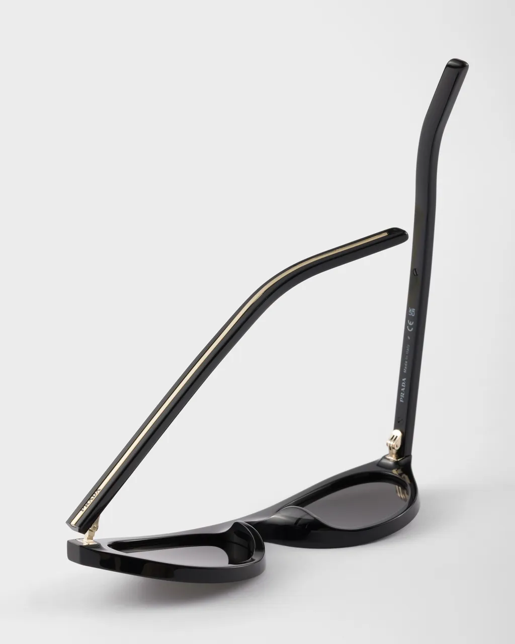 Prada Sunglasses With The Iconic Metal Plaque