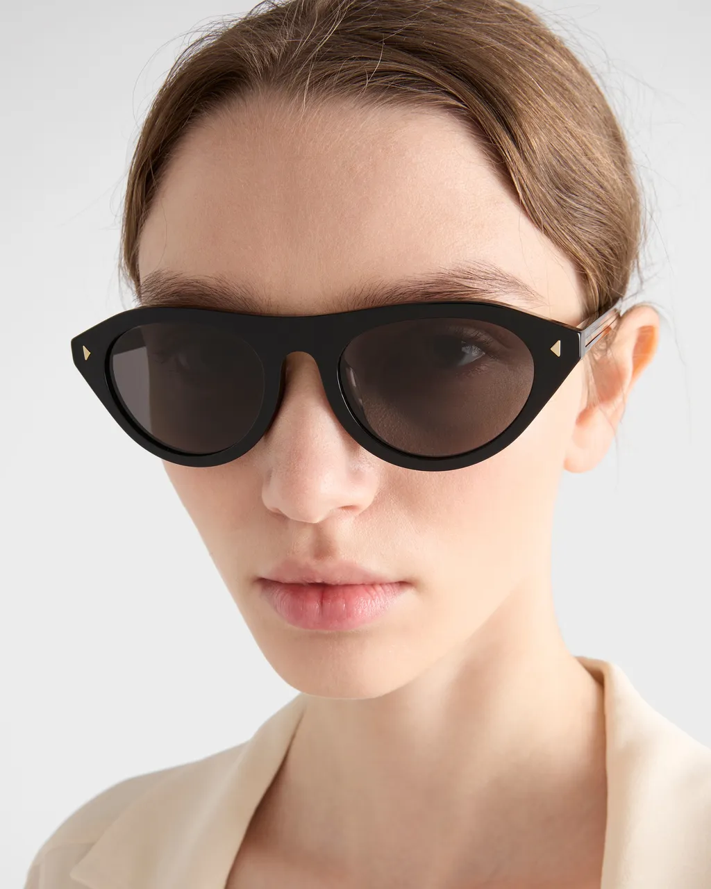 Prada Sunglasses With The Iconic Metal Plaque