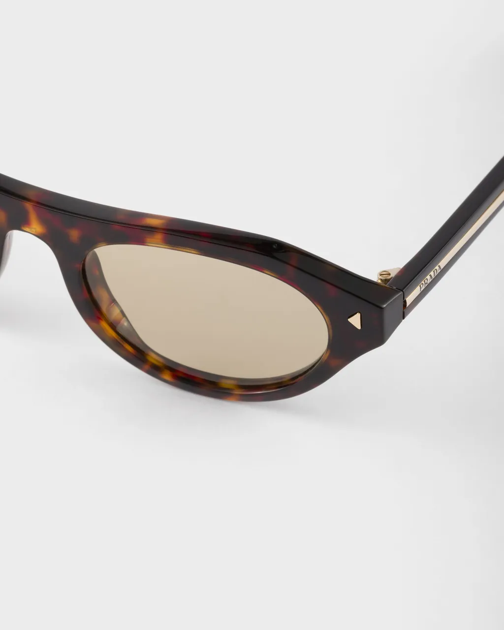 Prada Sunglasses With The Iconic Metal Plaque