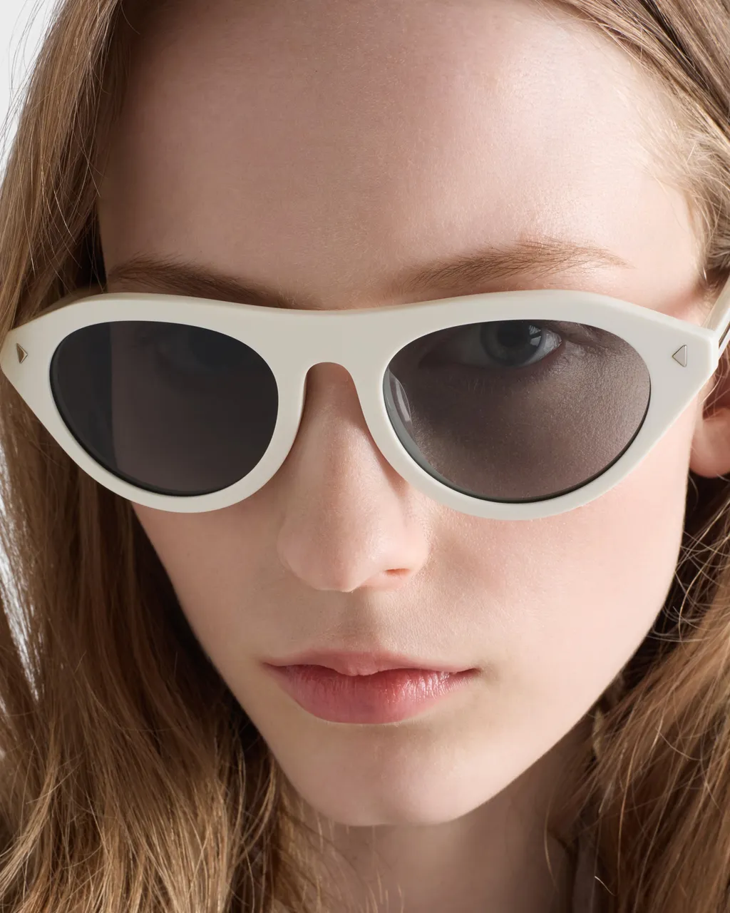 Prada Sunglasses With The Iconic Metal Plaque