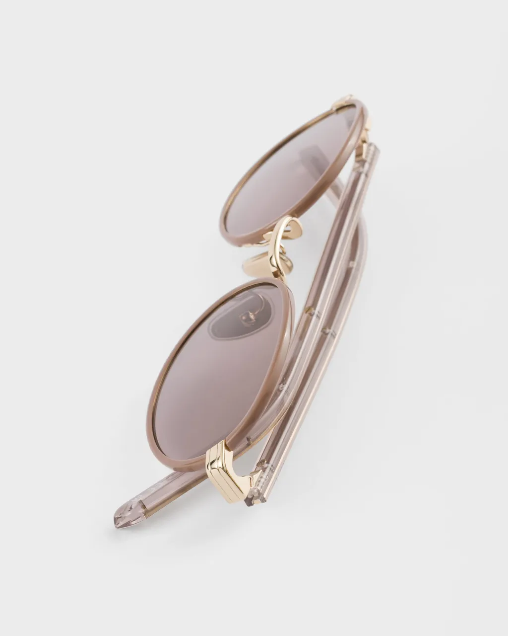 Prada Sunglasses With The Iconic Metal Plaque