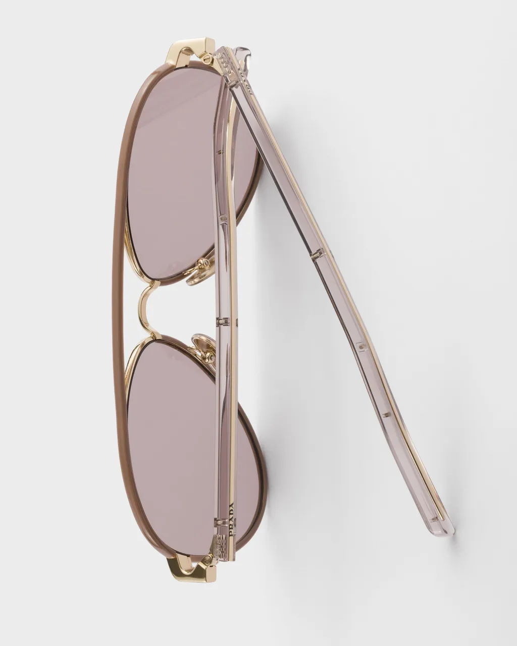 Prada Sunglasses With The Iconic Metal Plaque