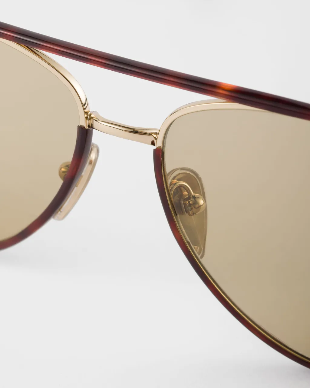 Prada Sunglasses With The Iconic Metal Plaque