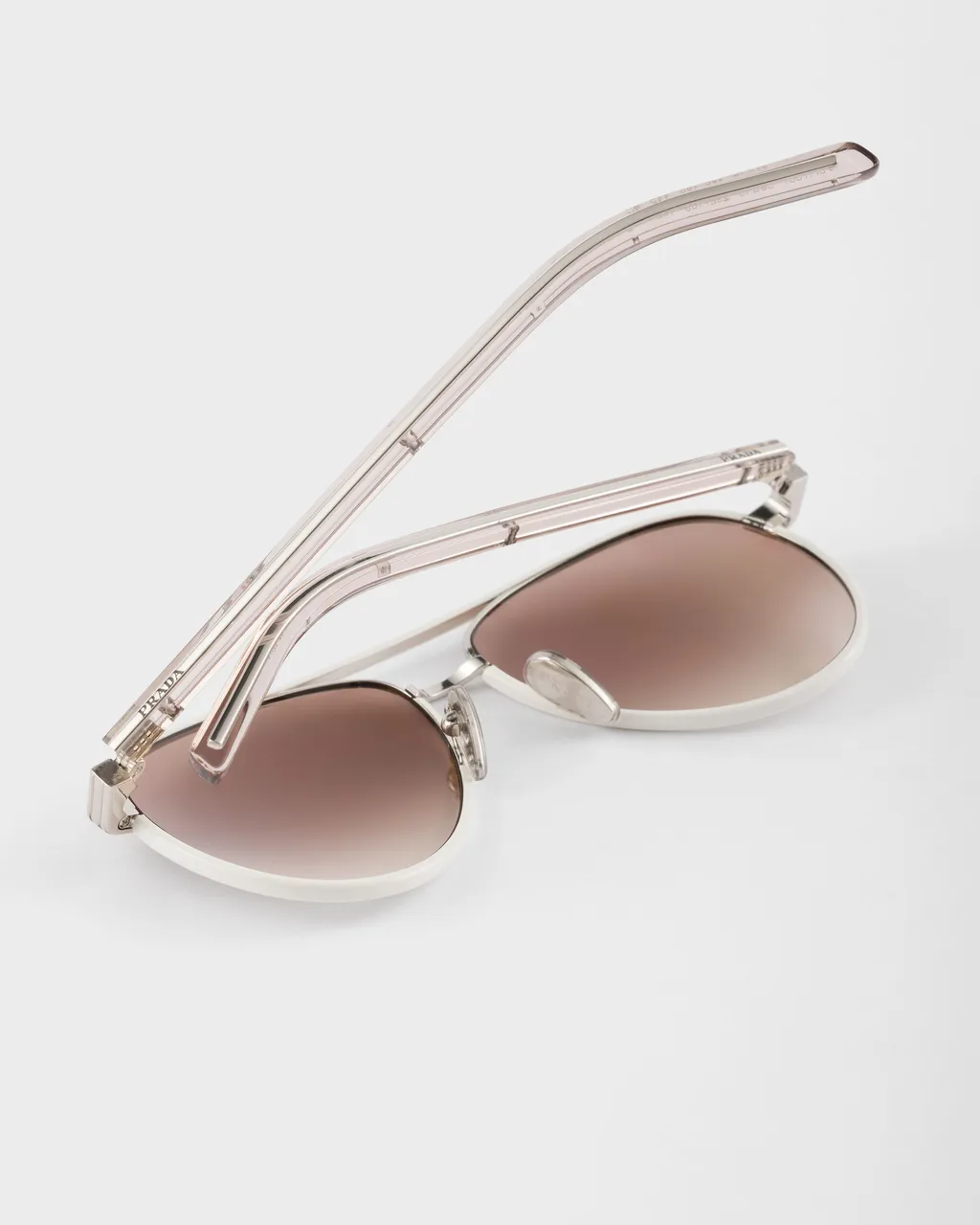 Prada Sunglasses With The Iconic Metal Plaque