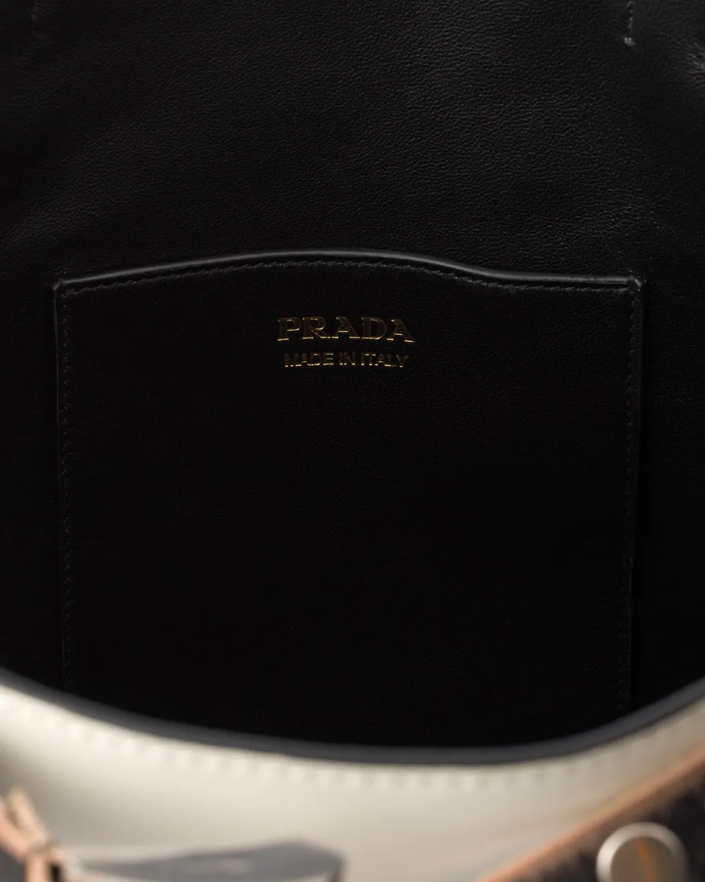 Prada Buckle Leather Bucket Bag With Studded Belt