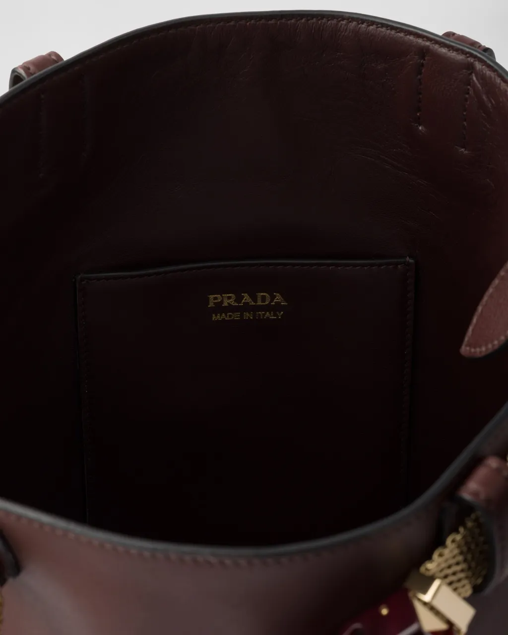 Prada Buckle Leather Bucket Bag With Jeweled Belt