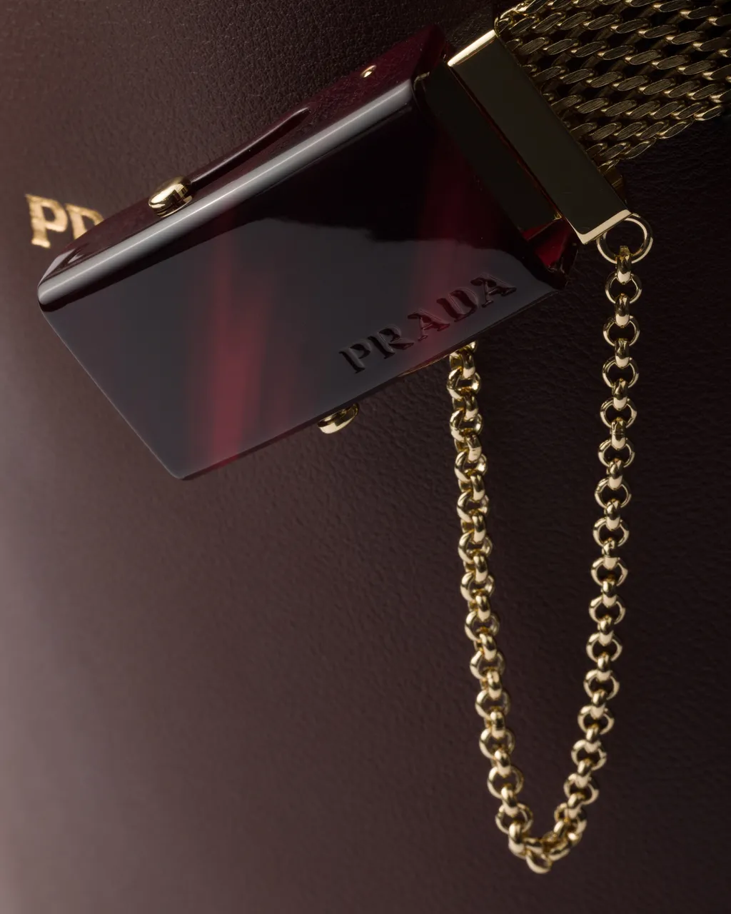 Prada Buckle Leather Bucket Bag With Jeweled Belt