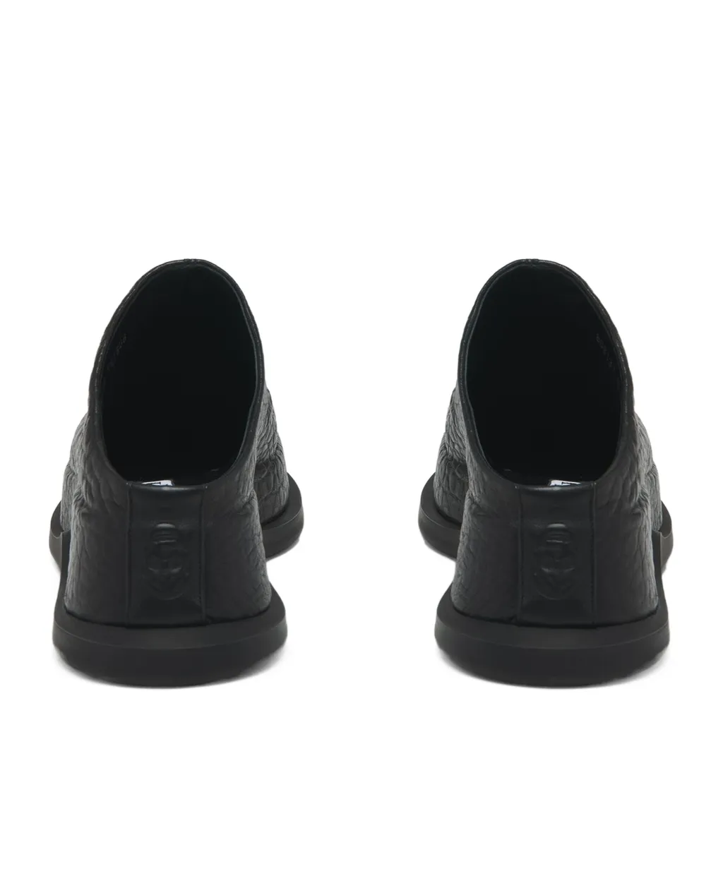 Wave Skull Embossed Mules