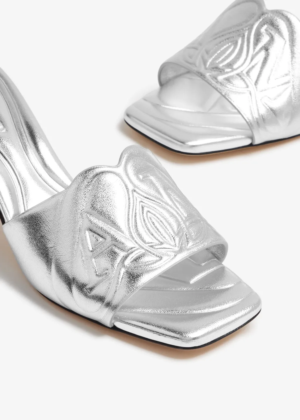 The Seal Embossed Metallic Sandals