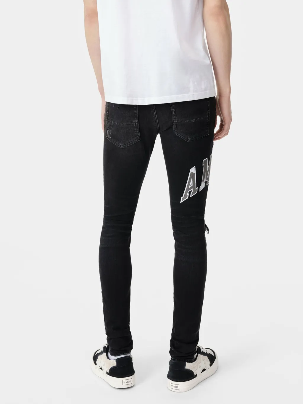 Logo Patch Distressed Skinny Jeans