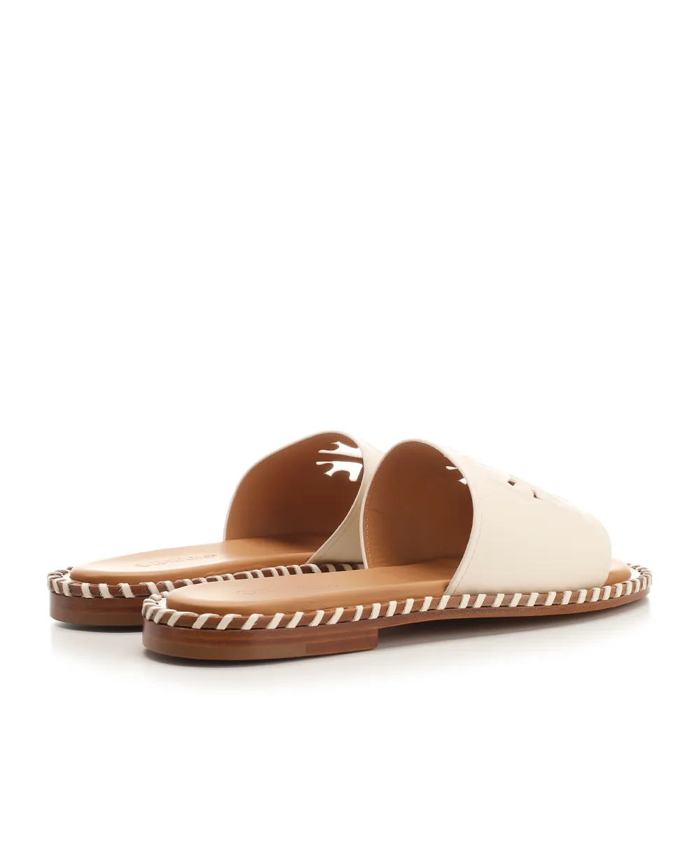 Twist Arrow-Embossed Slip-On Slides