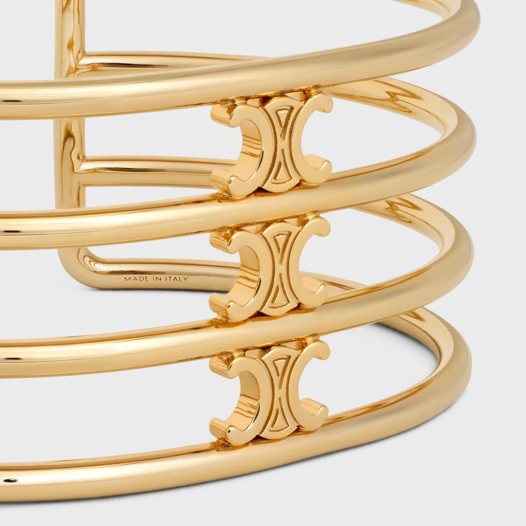 Triomphe Cage Cuff In Brass With Gold Finish