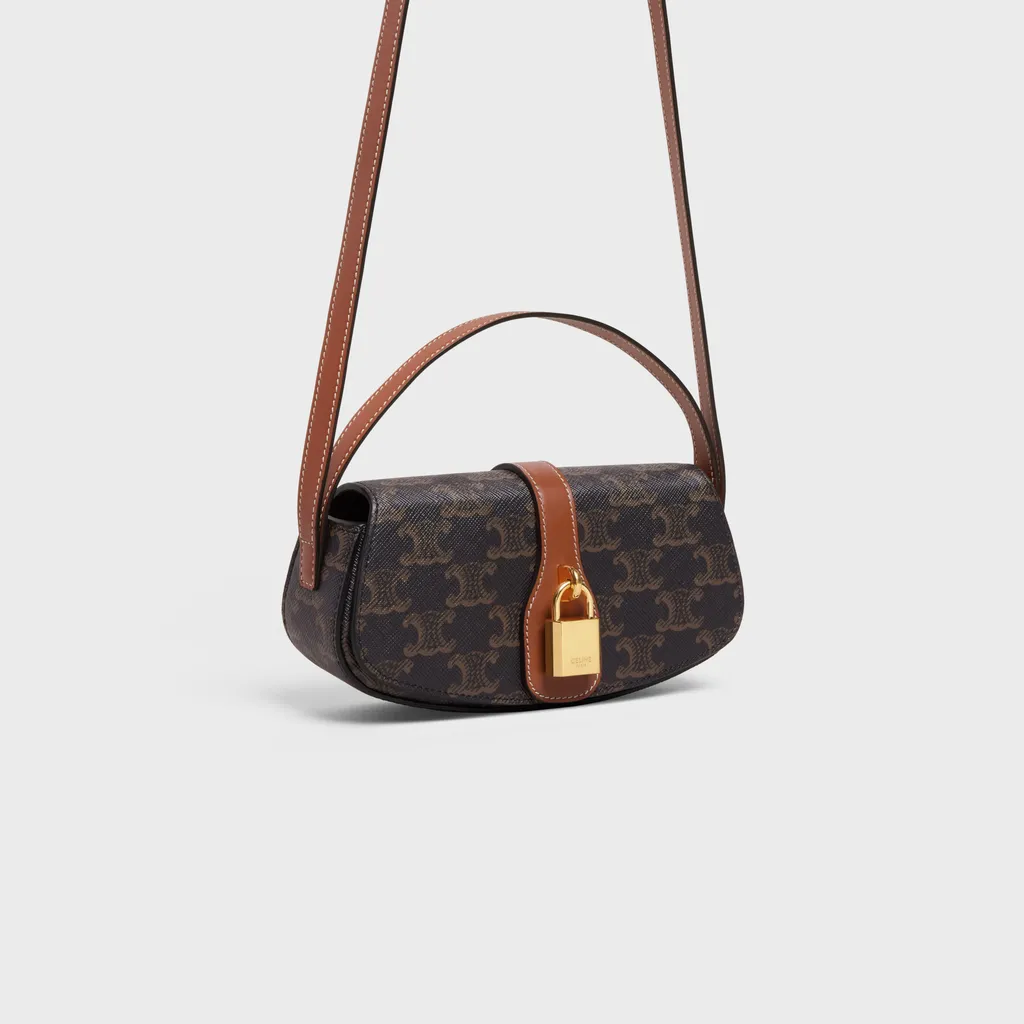 Clutch On Strap Tabou In Triomphe Canvas And Calfskin