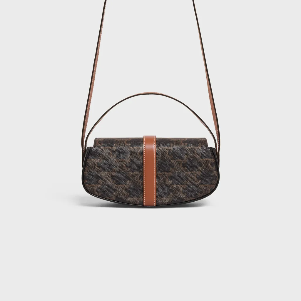 Clutch On Strap Tabou In Triomphe Canvas And Calfskin