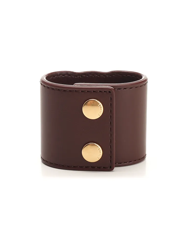 Triomphe Hair Cuff In Calfskin And Brass With Gold Finish
