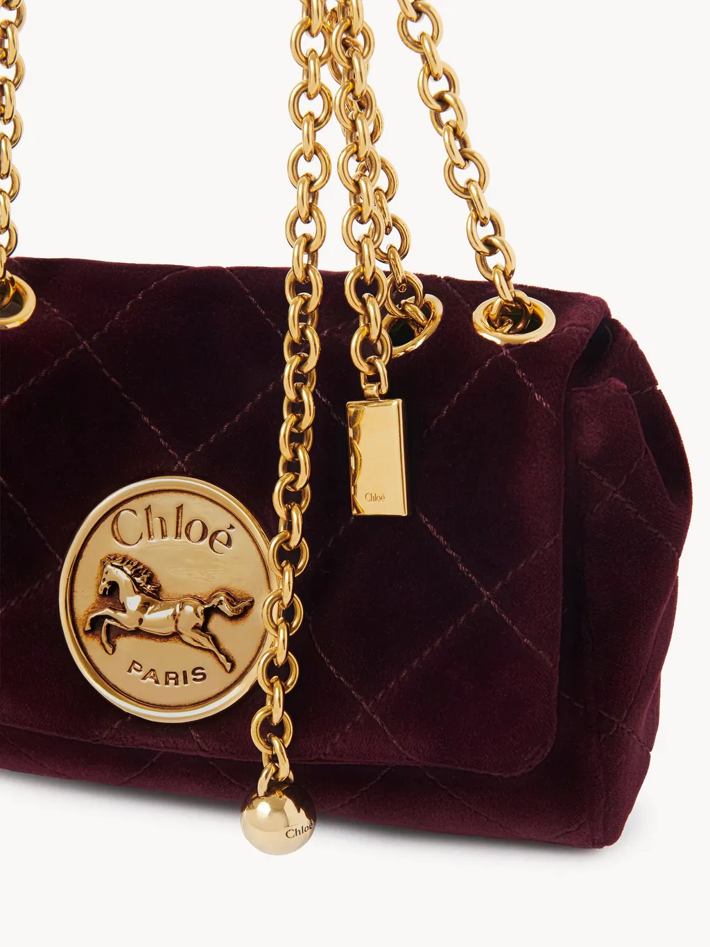 Logo Plaque Quilted Shoulder Bag