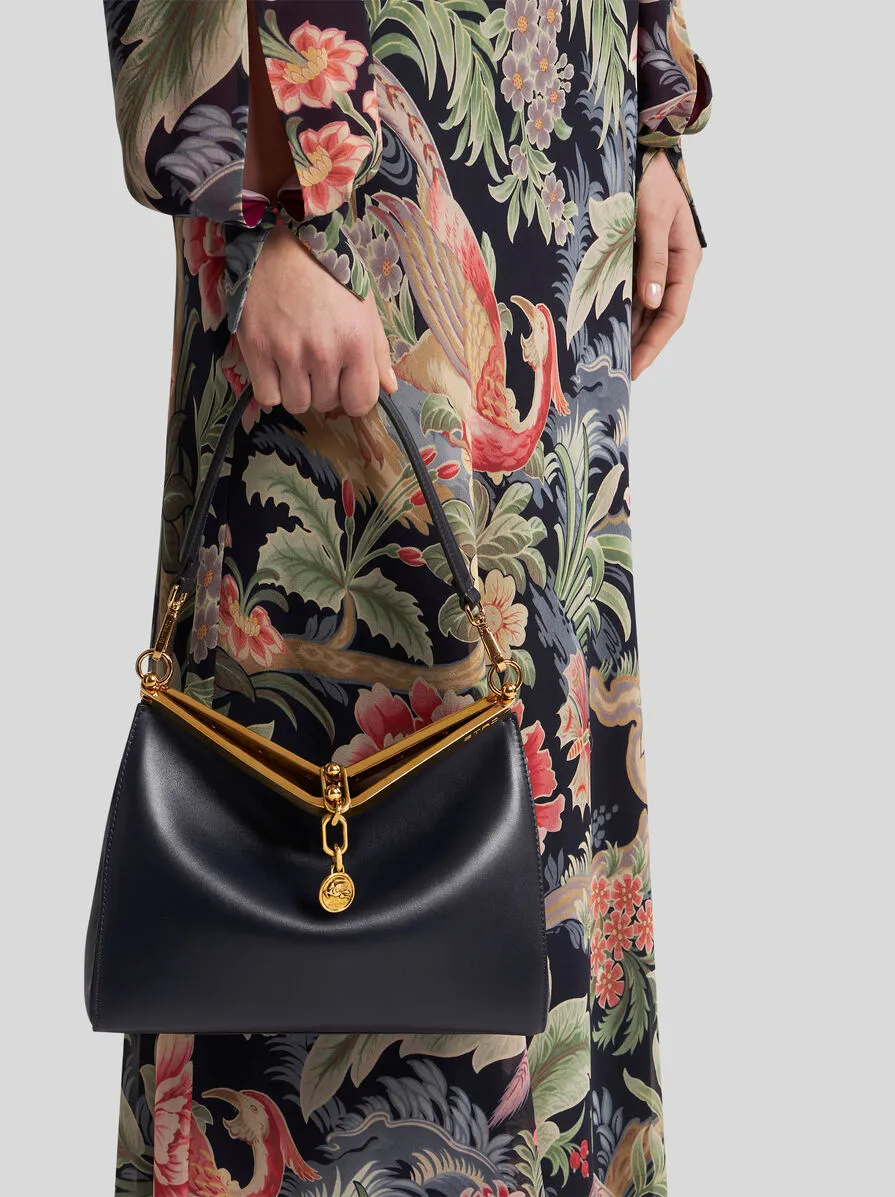 Log Charm Medium Vela Shoulder Bag
