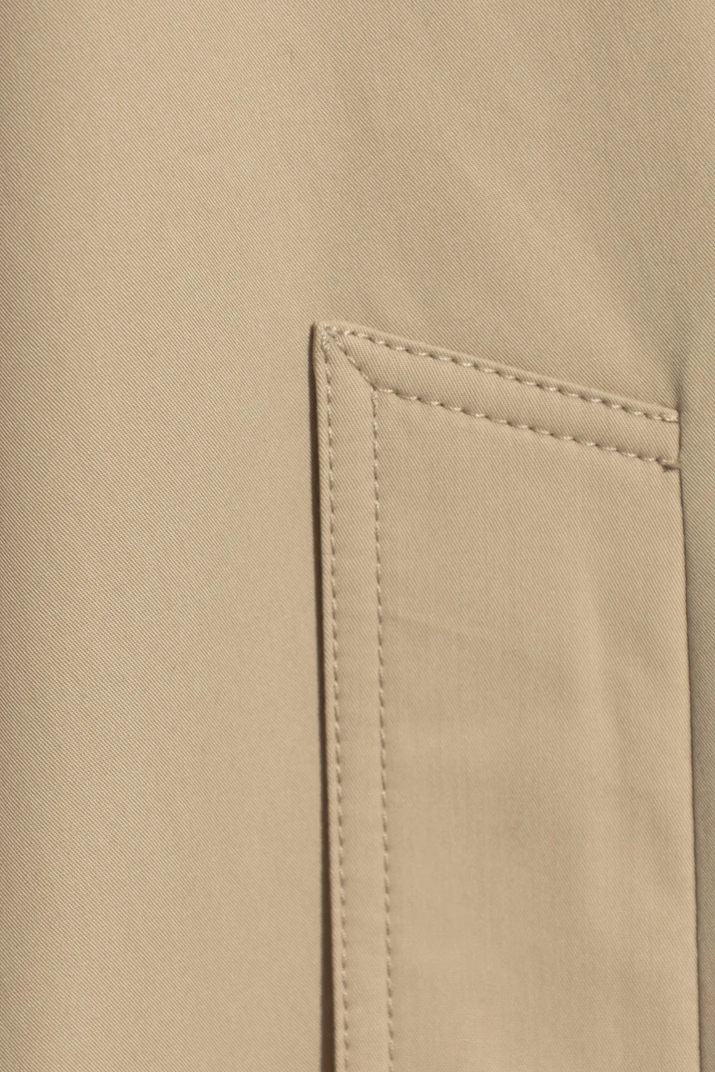 Curved Hem Coat