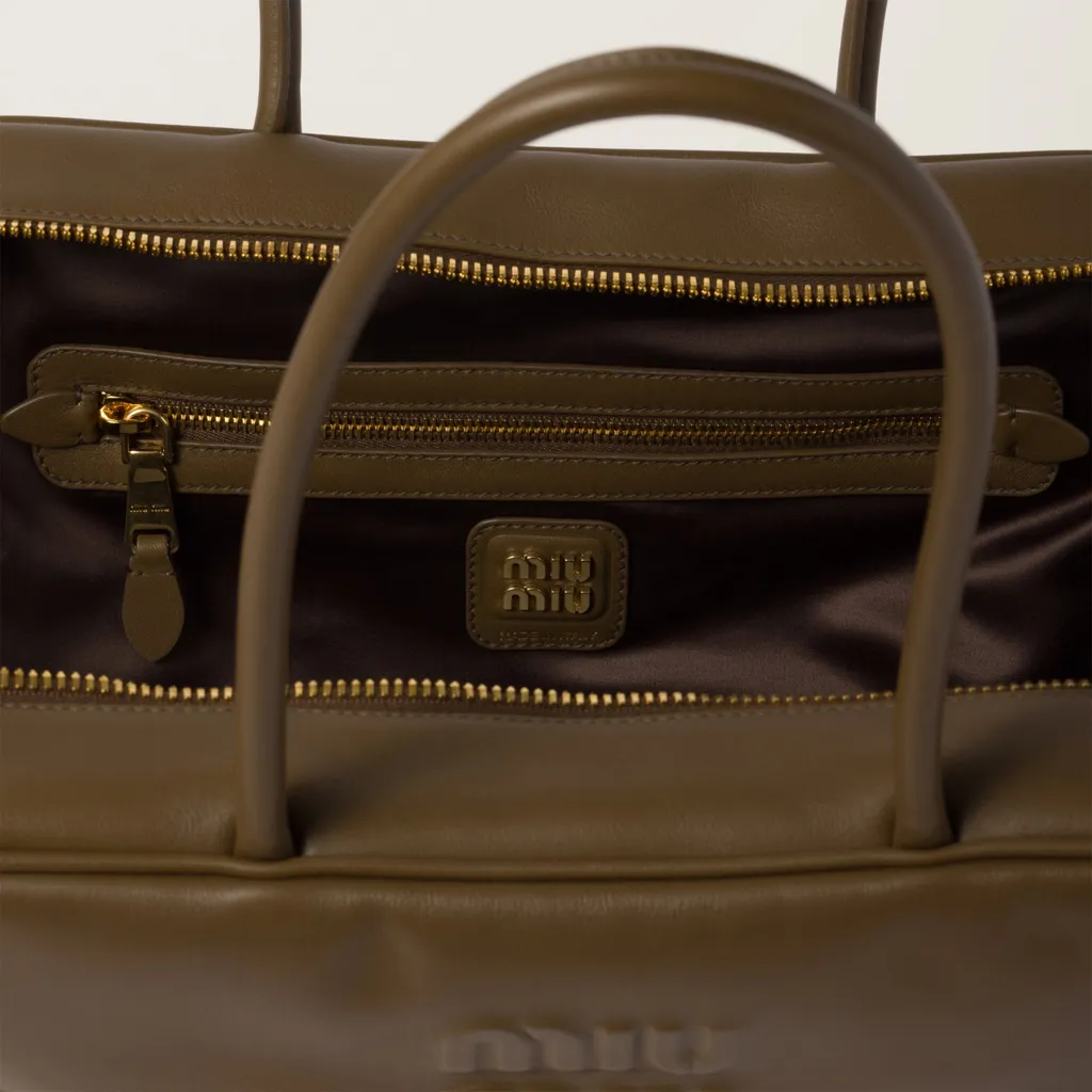 Logo-Embossed Zipped Handbag