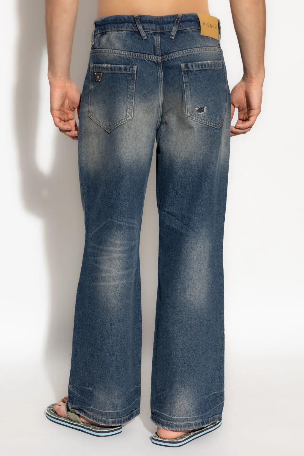 Faded Distressed Denim Trousers