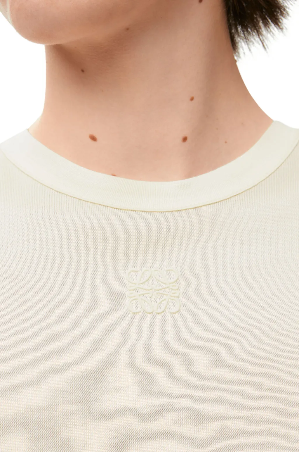 Knot-Detailed Top