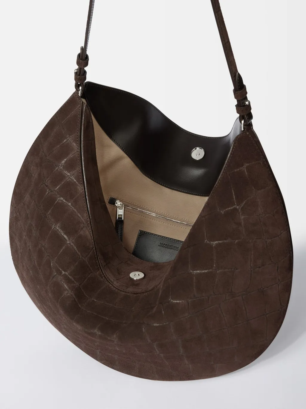 The Ovalo Logo Embossed Shoulder Bag