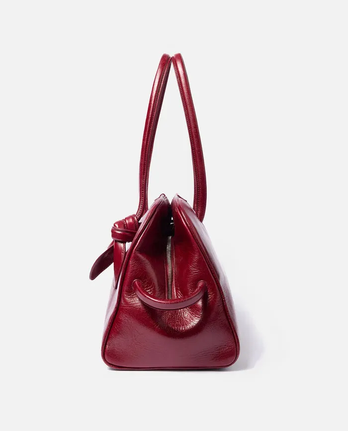 The Turismo Logo Embossed Bowling Bag