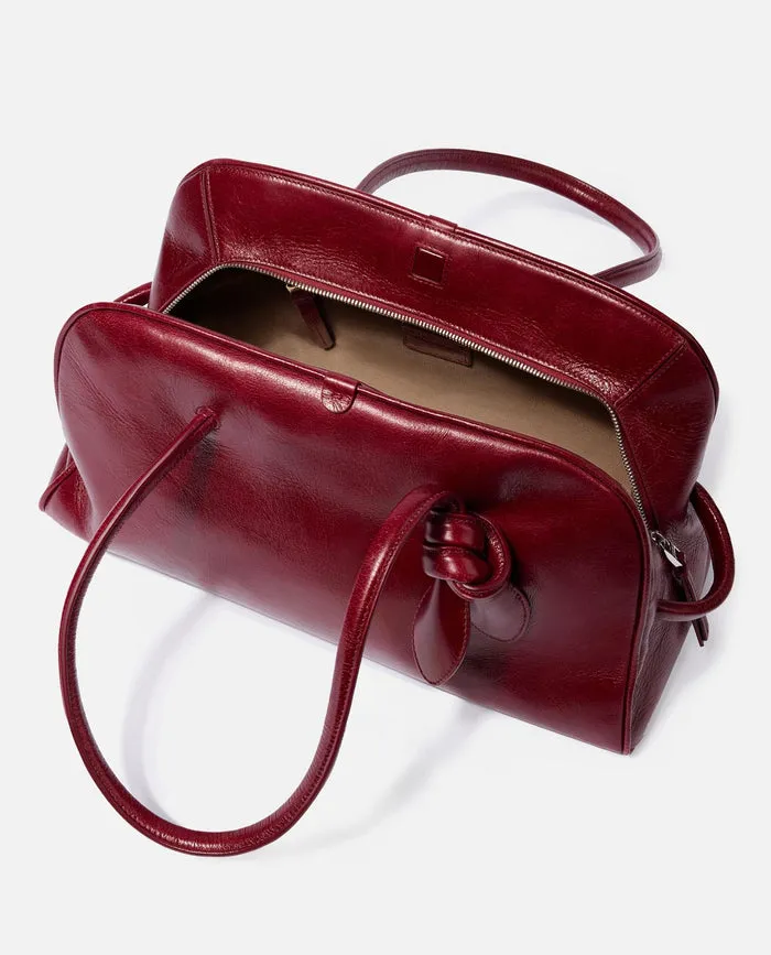 The Turismo Logo Embossed Bowling Bag
