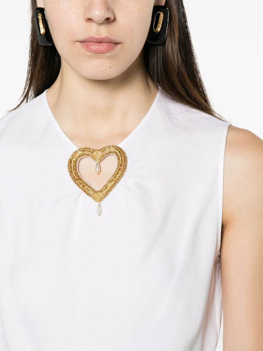 Heart Cut-Out Sleeveless Blouse