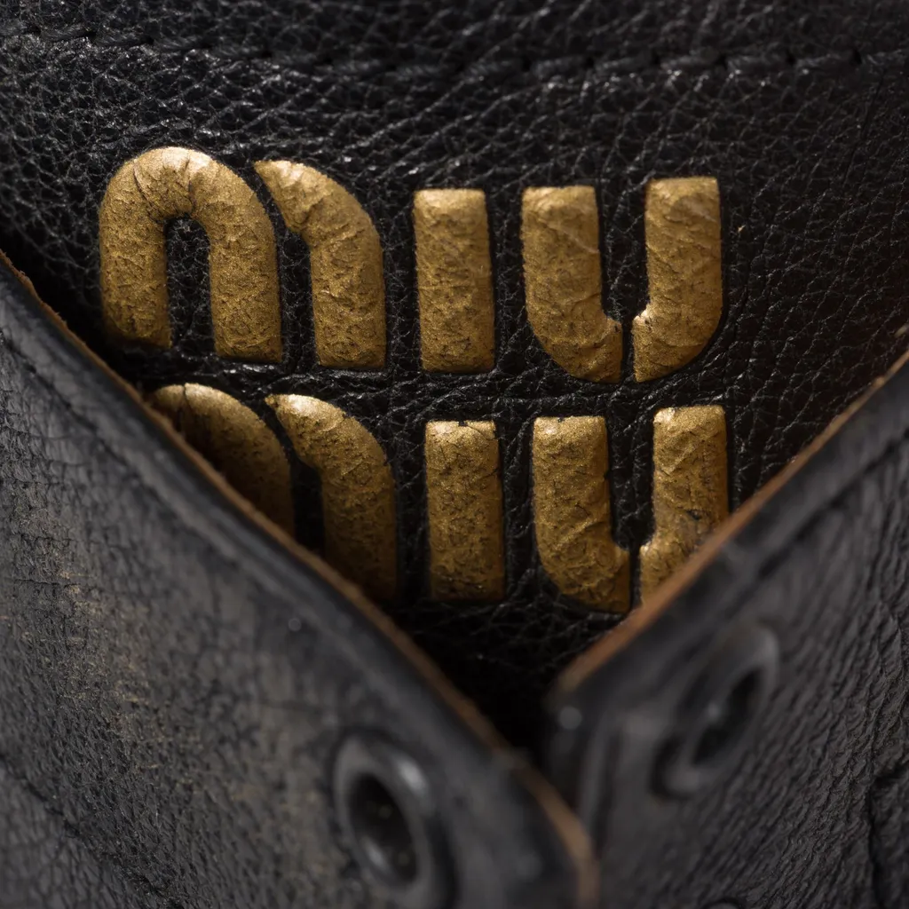 Logo-Embossed Lace-Up Boots